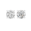 Pair of diamond stud earrings on a white background