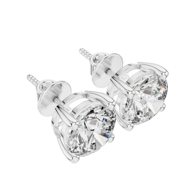 Pair of diamond stud earrings on a white background