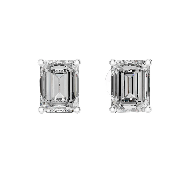 Pair of emerald-cut diamond earrings on a white background